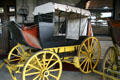 Open touring stage coach at Museum of the Yellowstone. West Yellowstone, MT.