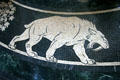 Detail of Rotunda floor mosaic of prehistoric saber tooth tiger in Nebraska State Capitol. Lincoln, NE.