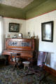 Original parlor with piano of Fredricksen House at County Historical Museum. North Platte, NE.