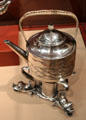 Silver tea kettle on stand by Gebelein Silversmiths of Boston, MA at Currier Museum of Art. Manchester, NH.