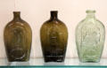Three glass pint flasks by Keene Glass Works of Keene, NH at Currier Museum of Art. Manchester, NH.