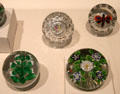 French glass paperweights with embedded flower & insect designs at Currier Museum of Art. Manchester, NH.