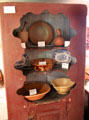 Wall cupboard with earthenware plates & bowls at Woodman Museum. Dover, NH.