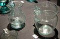 Green glass pitchers prob. from South Jersey at Museum of American Glass. Milville, NJ.