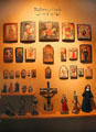 Spanish religious icon paintings & carvings at New Mexico History Museum. Santa Fe, NM.