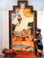 Santos de Nuevo Mexico painting with carving of San Ysidro, patron saint of farming, by Charlie Carrillo in NM State Capitol Art Collection. Santa Fe, NM.