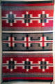 Untitled red & gray weaving by Annie Succo in NM State Capitol Art Collection. Santa Fe, NM.