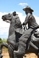 Horse & rider in Journey's End Santa Fe Trail sculpture. Santa Fe, NM.
