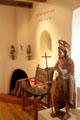 St John the Baptist Mexican sculpture , leather chair & gallery in Museum of Spanish Colonial Art. Santa Fe, NM.