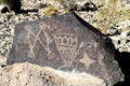 Petroglyph with paired figures at Petroglyph National Monument. Albuquerque, NM