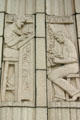 Reliefs of editor & linotyper on former newspaper Courier Express Building. Buffalo, NY.