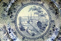 Blue transferware plate from Staffordshire, England showing Erie Canal at Buffalo in Buffalo History Museum. Buffalo, NY.