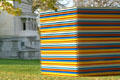 Multicolored sculpted box on lawn of Albright-Knox Art Gallery. Buffalo, NY.