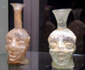 Roman glass grotesque head flasks found in Germany & France at Corning Museum of Glass. Corning, NY.