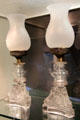 Pair of oil lamps from New England at Corning Museum of Glass. Corning, NY.