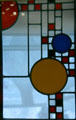 Playhouse stained glass window by Frank Lloyd Wright from Avery Coonley Home, Riverside, IL at Corning Museum of Glass. Corning, NY.