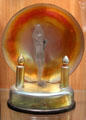 Art Deco Aurene table lamp with large disk behind figure by Steuben Glass at Corning Museum of Glass. Corning, NY.