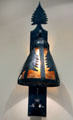 Metalwork wall lamp with western theme at Rockwell Museum of Art. Corning, NY.