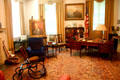 F.D. Roosevelt's Presidential Library study as it stood when he died in office with his wheel chair, portrait of his mother, & replica of desk used by George Washington. Hyde Park, NY.