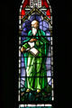 Stained glass windows with Venerable Bede in Sage Chapel on Cornell Campus. Ithaca, NY.
