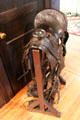 Saddle on Roycroft saddle rack at Elbert Hubbard Roycroft Museum. East Aurora, NY.