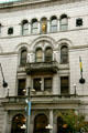Facade of Monroe County Office Building with justice statue. Rochester, NY.