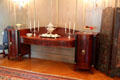 Antique one piece polished hardwood sideboard serving table with end cabinets at Eastman House. Rochester, NY