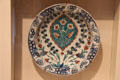Turkish terracotta plate with flowers from Iznik at Memorial Art Gallery. Rochester, NY.