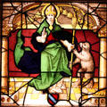 German stained-glass window shows Bishop Saint with Bear at Memorial Art Gallery. Rochester, NY.