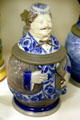 Cobalt blue beer stein in form of man with pipe & smoking jacket from Germany at The Strong National Museum of Play. Rochester, NY.