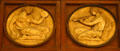 Relief roundels showing Terpsichore & Euterpe muses on Rush Rhees Library facade at University of Rochester. Rochester, NY.