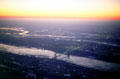 George Washington Bridge over Hudson River at sunset from air. New York, NY.