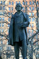 John Ericsson statue by Jonathan Scott Hartley holds Ironclad Monitor model which Ericsson designed. New York, NY.