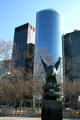 17 State St. beyond Eagle of East Coast Memorial on Battery Park. New York, NY.