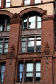 Facade details of Schermerhorn Building on Lafayette St. New York, NY.