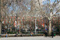People sitting in Washington Square Park. New York, NY.