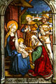 Adoration of Magi stained glass window from Munich at The Cloisters. New York, NY.
