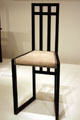 Highback chair by Josef Hoffmann made by Wiener Werkstätte, Austria at MoMA. New York, NY.