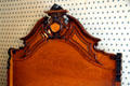 Headboard made of rosewood & satinwood in bedroom at Theodore Roosevelt Birthplace. New York, NY.