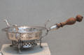 Silver chafing dish by John Burt of Boston at Metropolitan Museum of Art. New York, NY.
