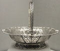 Silver lacy basket by Myer Myers of New York City at Metropolitan Museum of Art. New York, NY.