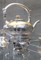 Silver Arts & Crafts teakettle on stand by James T. Woolley of Boston at Metropolitan Museum of Art. New York, NY.