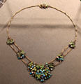 Black opals, gold, enamel grape cluster necklace by Louis C. Tiffany at Metropolitan Museum of Art. New York, NY.