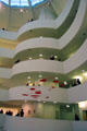 Wright's balconies integrate display of modern art at Guggenheim Museum. New York City, NY.
