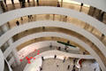 Wright's balcony galleries vary as visitors progress around spiral at Guggenheim Museum. New York City, NY.