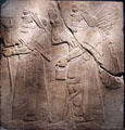 Assyrian relief of King Ashur-nasir-pal II & winged genie from King Ashur-nasir-pal II palace of Nimrud at Brooklyn Museum. Brooklyn, NY.