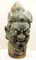 Carved wood guardian head from Japan at Brooklyn Museum. Brooklyn, NY.