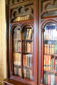 Glass-fronted bookcase in library at Lindenwald. Kinderhook, NY.