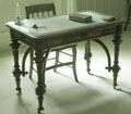 Writing table with curved braces supporting thin legs at Lindenwald. Kinderhook, NY.