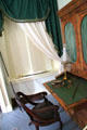 Secretary-bookcase, late classical style, & armchair in Martin Van Buren's bedroom at Lindenwald. Kinderhook, NY.
